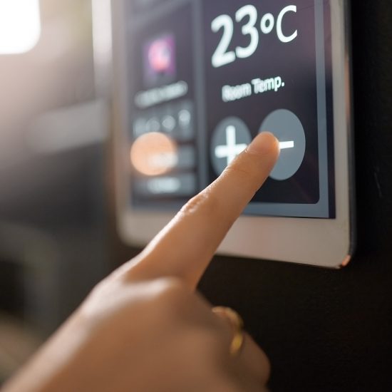 Smart home system, wall and woman hands with digital app monitor for thermostat heating, temperatur.